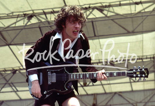 Angus Young by Dean Simmon