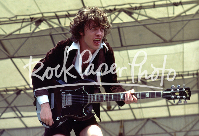 Angus Young by Dean Simmon